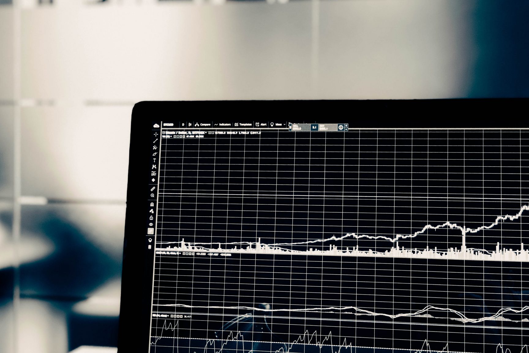 A set of graphs in black and white on a computer screen.